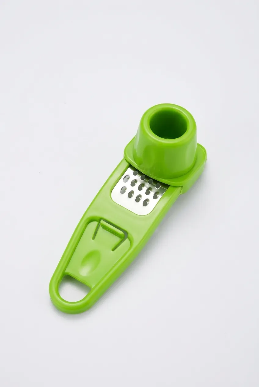 Plastic & Stainless Steel Garlic Peeler, 15 Cm - Green HK1424PEEGRE